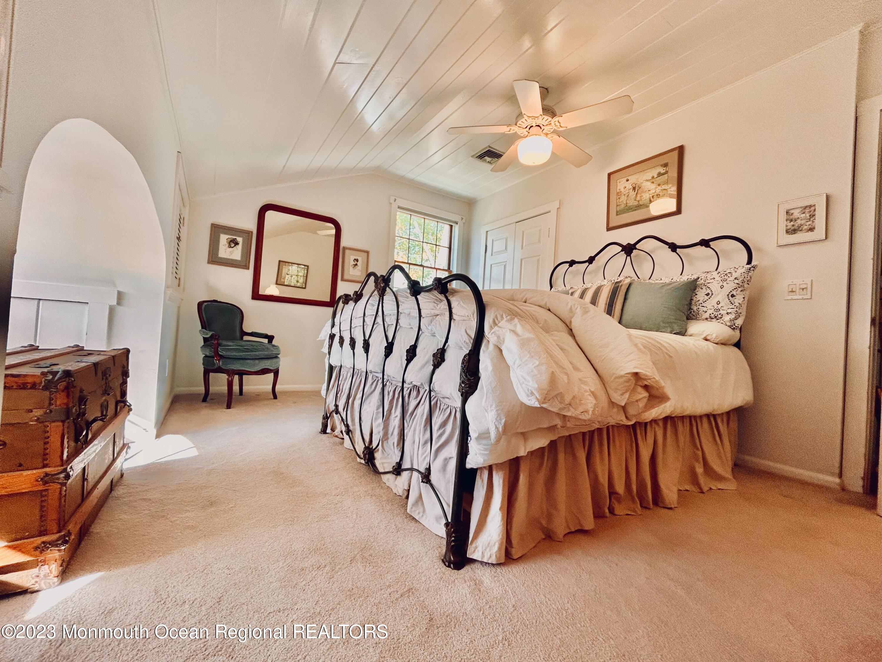 208 Passaic Avenue Spring Lake, NJ 07762 - Photo 10 of 19 a bedroom with furniture and white walls