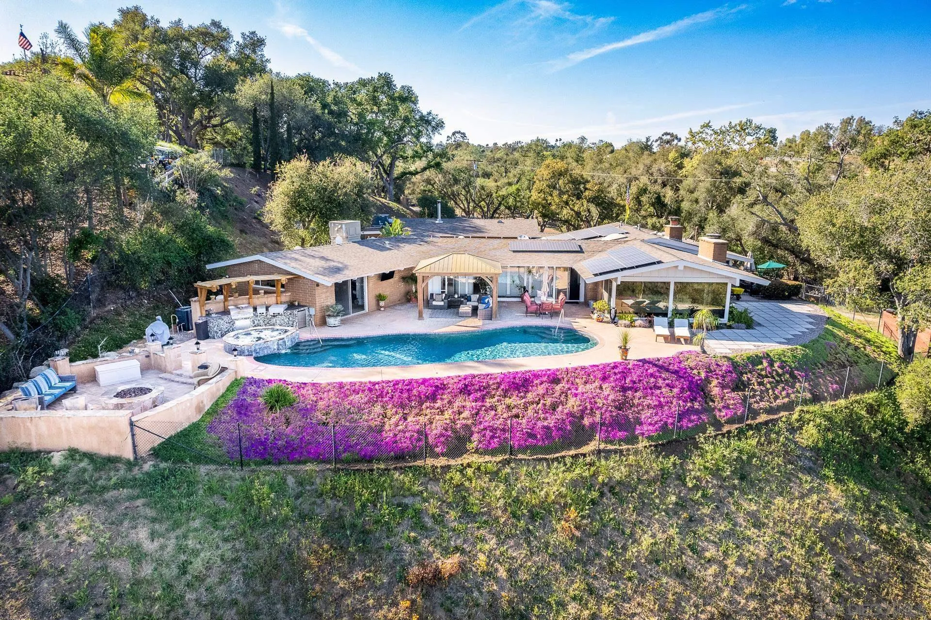 3978 Ladera Vista Road Fallbrook, CA 92028 - Photo 1 of 48 an outdoor space with lots of trees and buildings