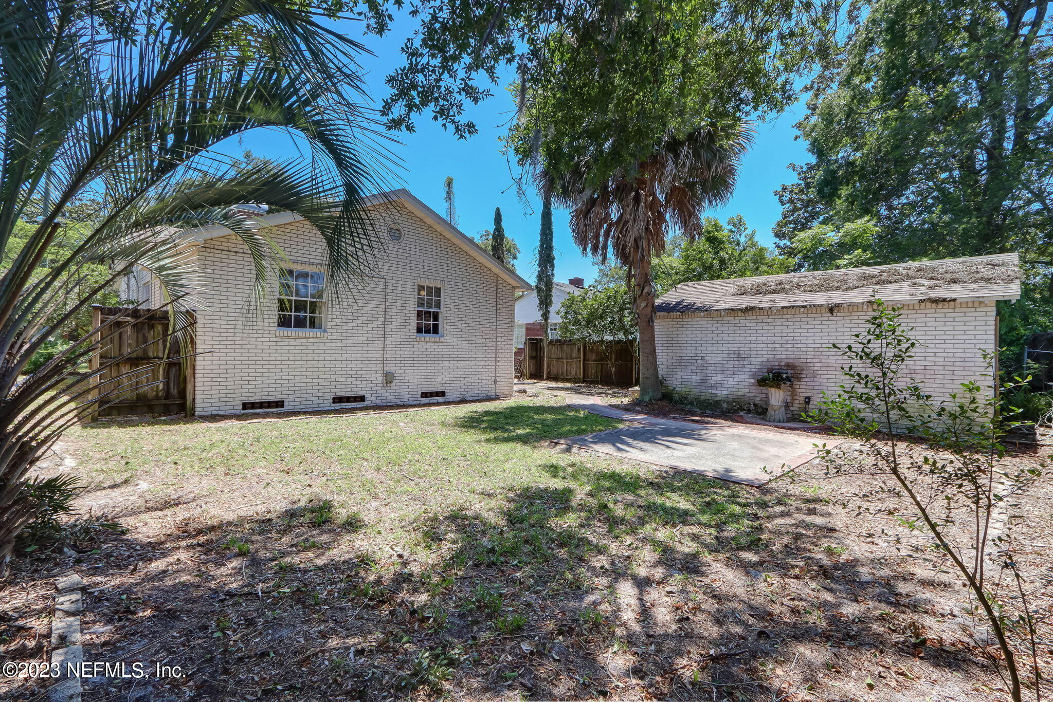 1642 Pershing Road Jacksonville, FL 32205 - Photo 18 of 29 a house with a tree in front of it