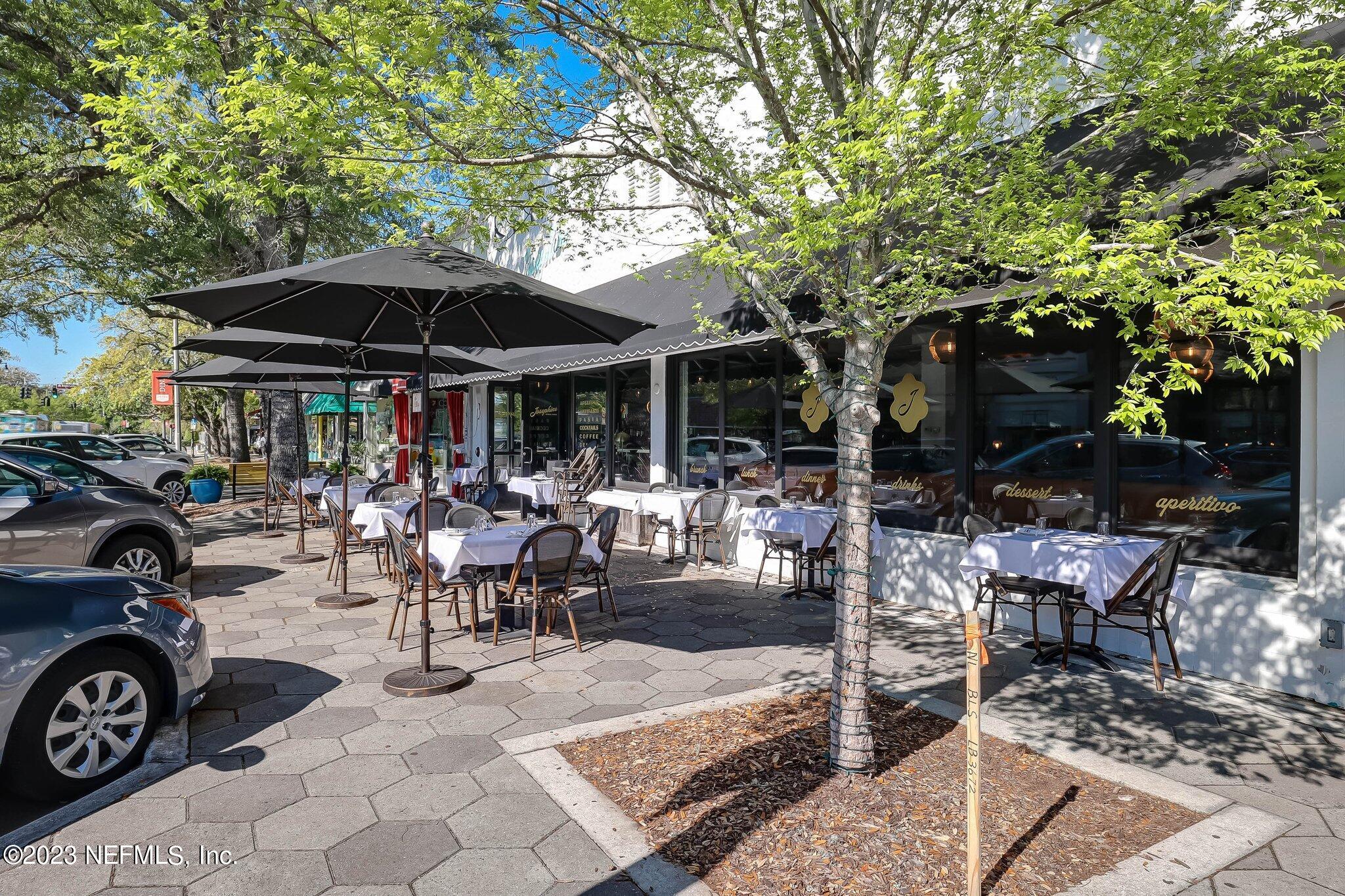 1642 Pershing Road Jacksonville, FL 32205 - Photo 27 of 29 a view of a chairs and tables in a patio