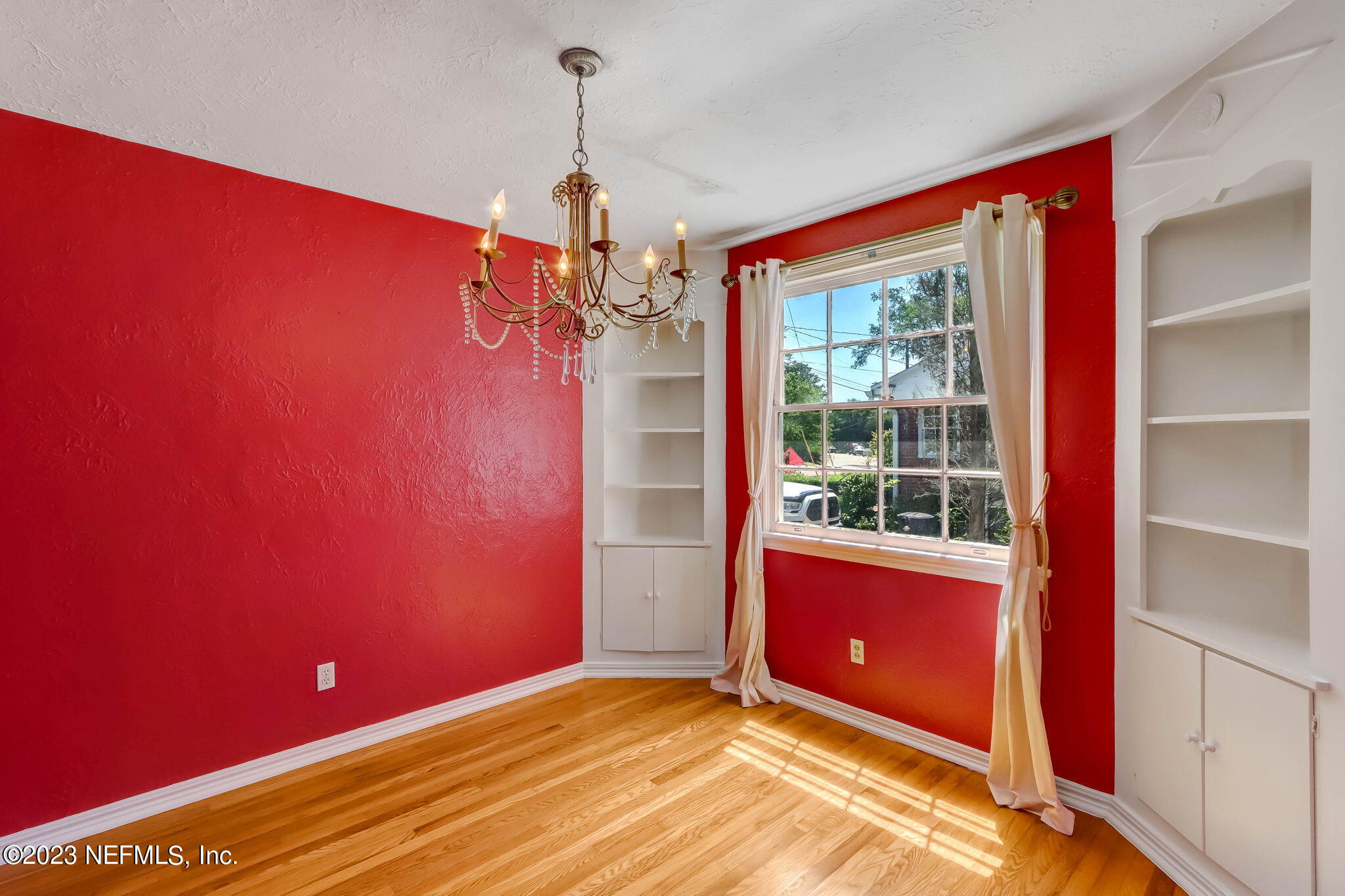 1642 Pershing Road Jacksonville, FL 32205 - Photo 4 of 29 a view of an empty room with a window