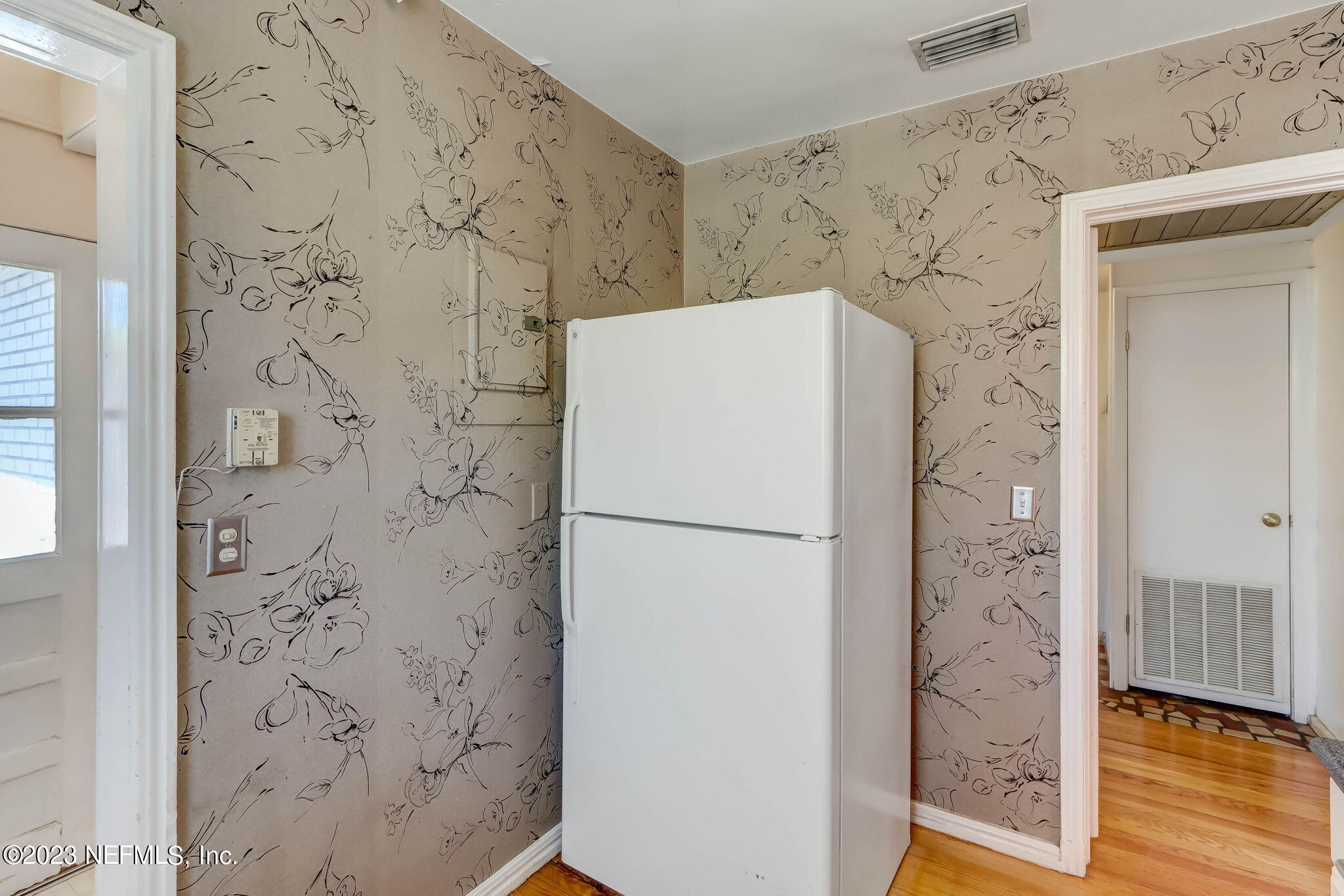 1642 Pershing Road Jacksonville, FL 32205 - Photo 6 of 29 a white refrigerator freezer sitting inside of a kitchen