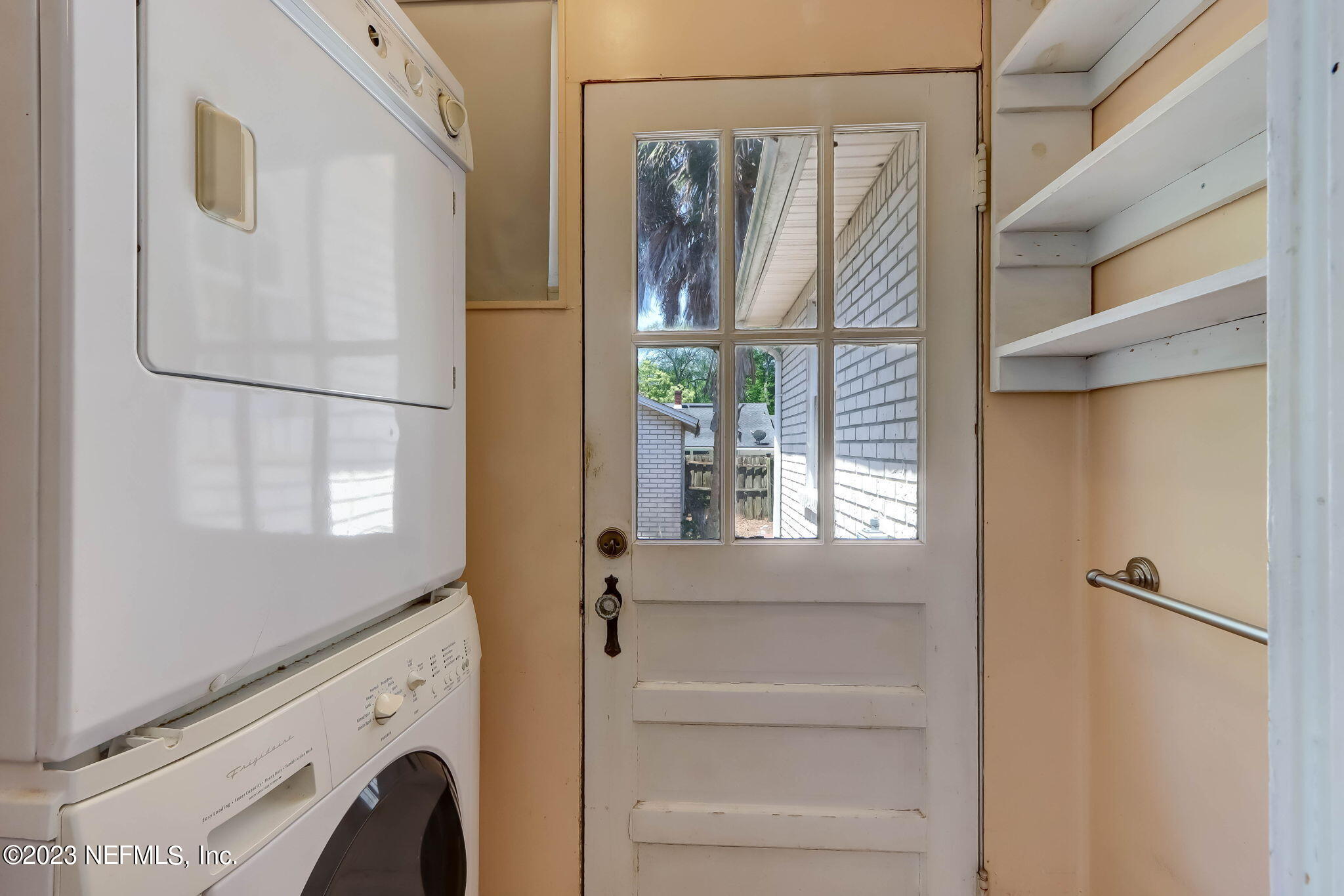 1642 Pershing Road Jacksonville, FL 32205 - Photo 7 of 29 a view of walk in closet with window and shower