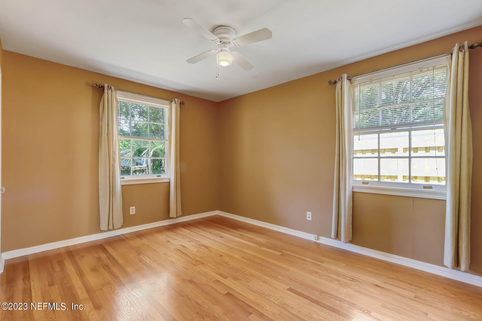 1642 Pershing Road Jacksonville, FL 32205 - Photo 10 of 29 a view of an empty room with a window
