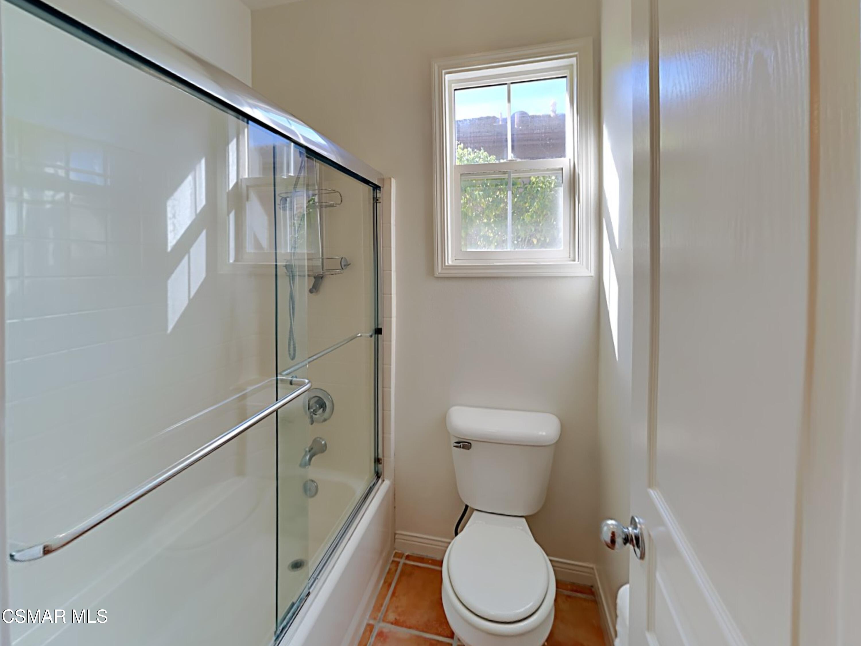 115 Parkside Drive Simi Valley, CA 93065 - Photo 19 of 27 a bathroom with a toilet a sink and a bathtub