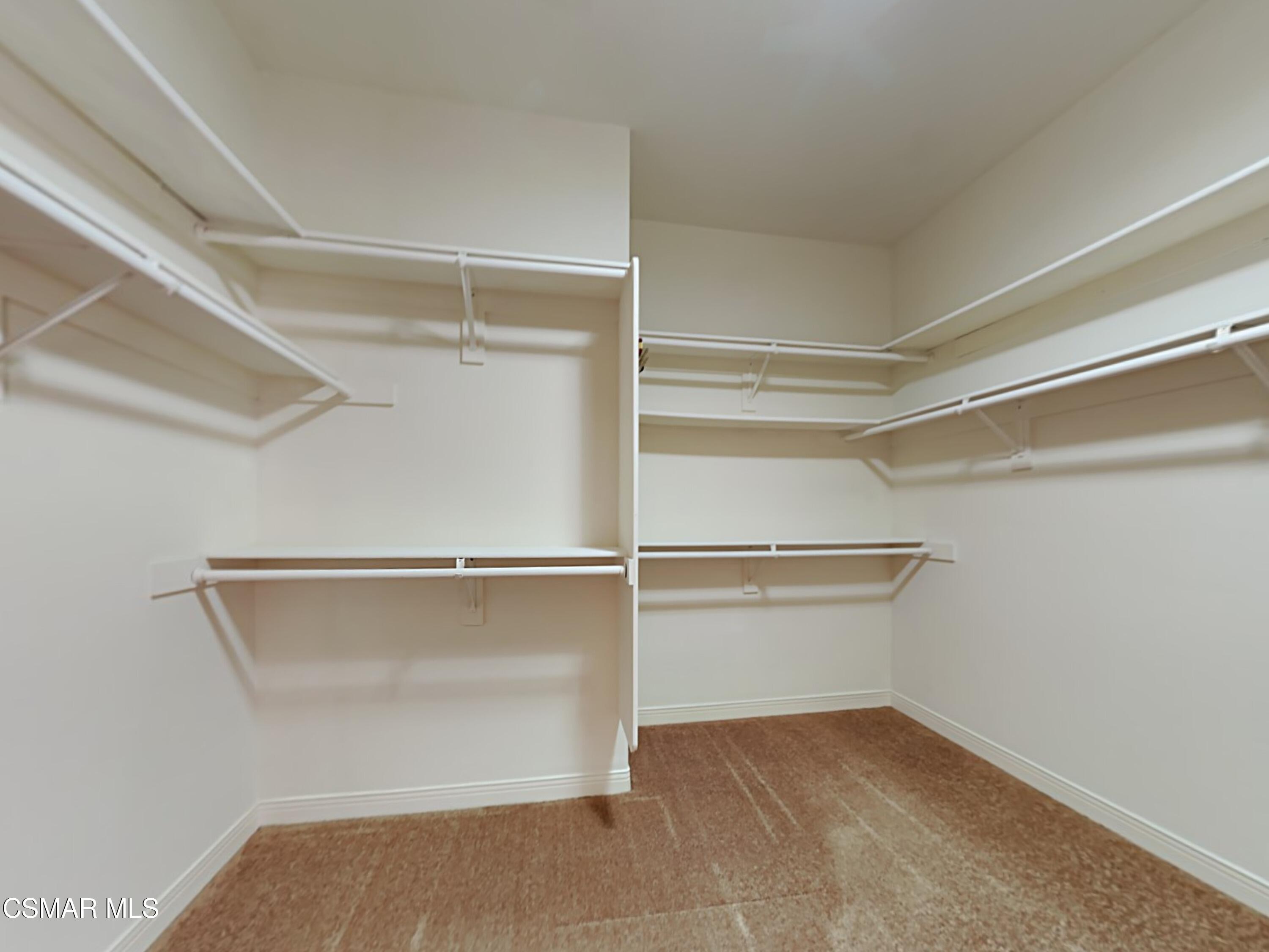 115 Parkside Drive Simi Valley, CA 93065 - Photo 22 of 27 a view of an empty walk in closet