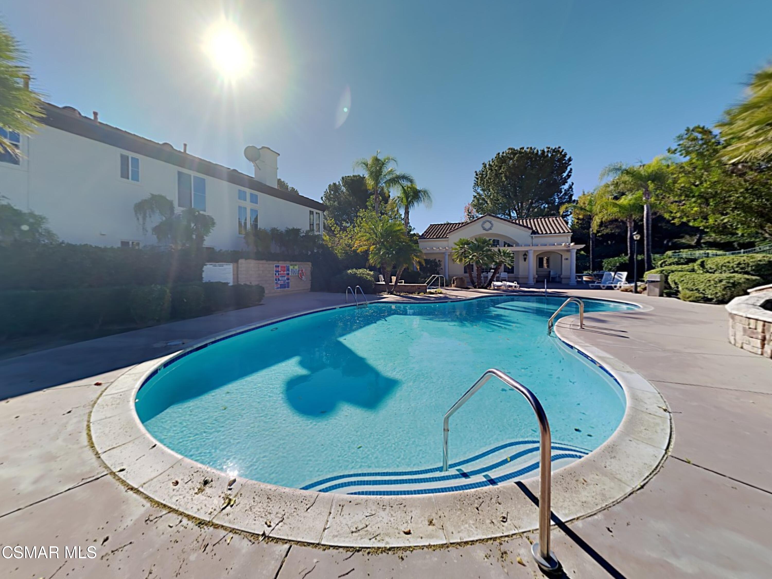 115 Parkside Drive Simi Valley, CA 93065 - Photo 23 of 27 a view of a swimming pool with a chairs