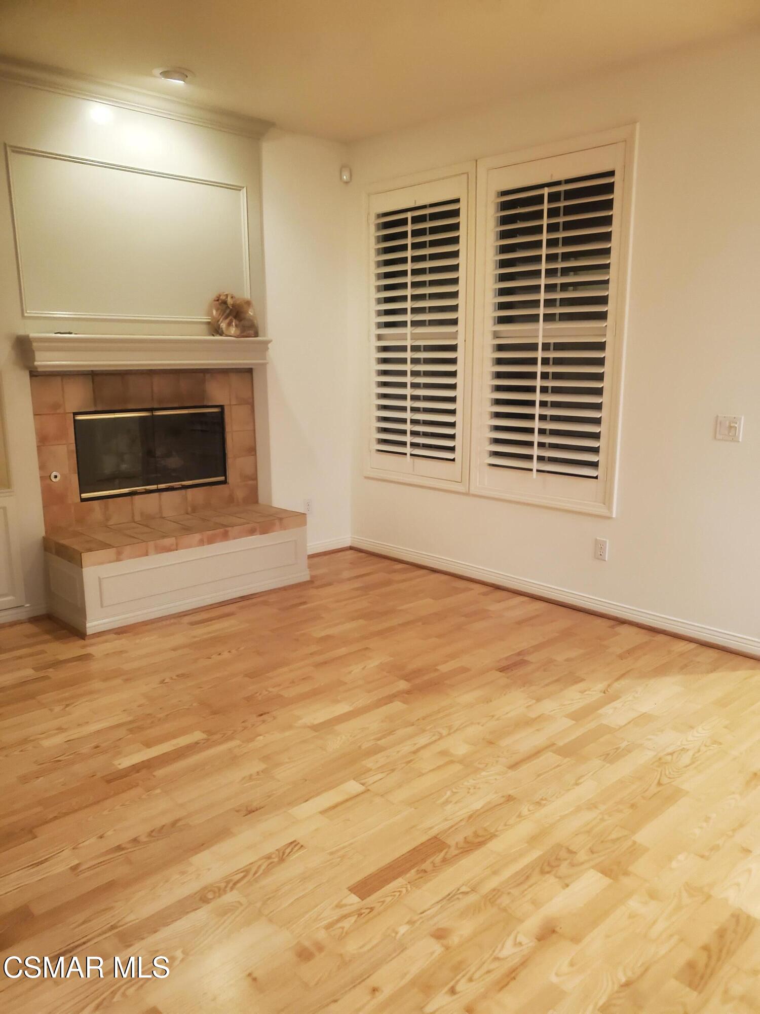 115 Parkside Drive Simi Valley, CA 93065 - Photo 7 of 27 a view of an empty room with a fireplace