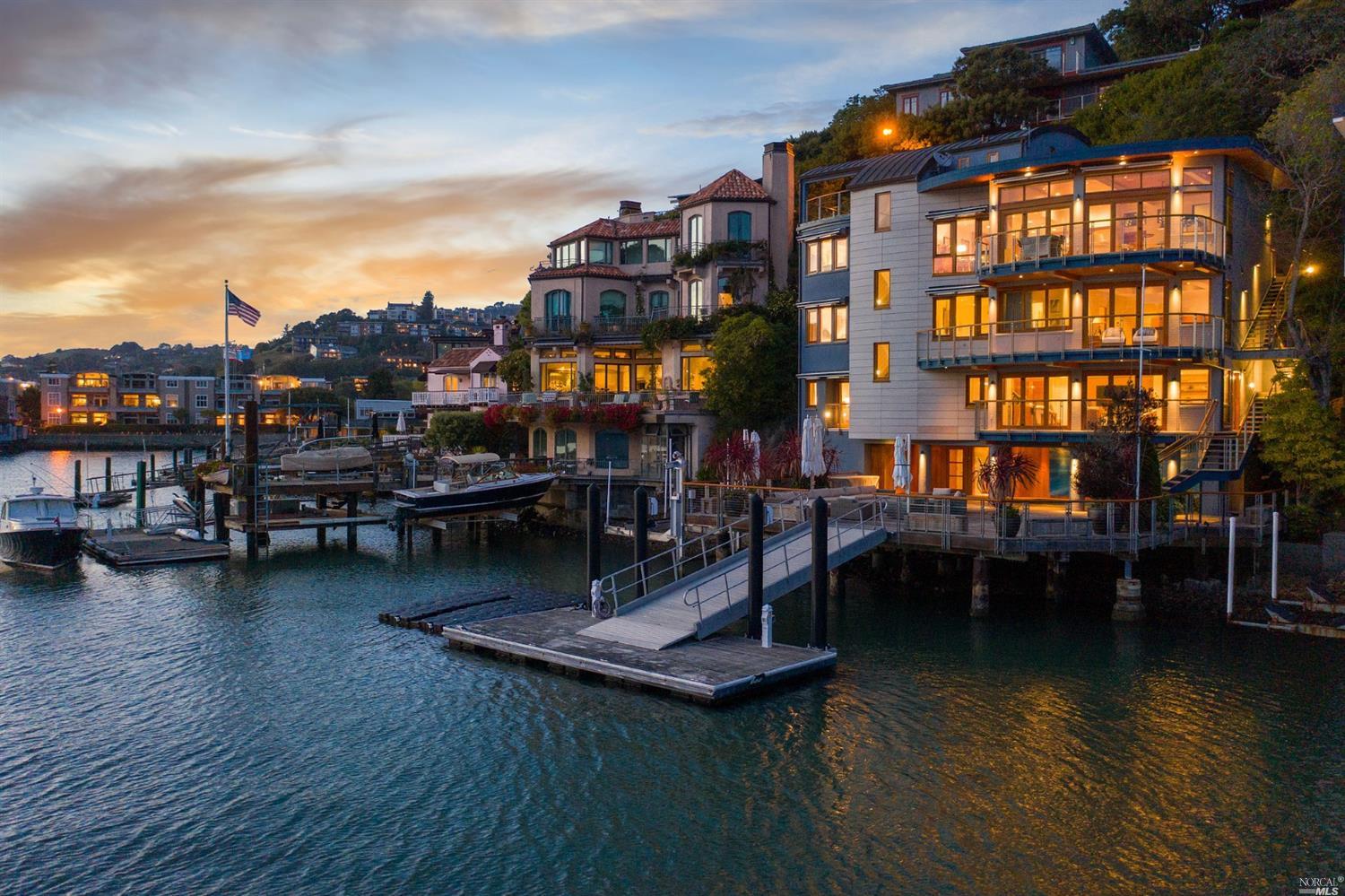 a view of pool chair and table in yard