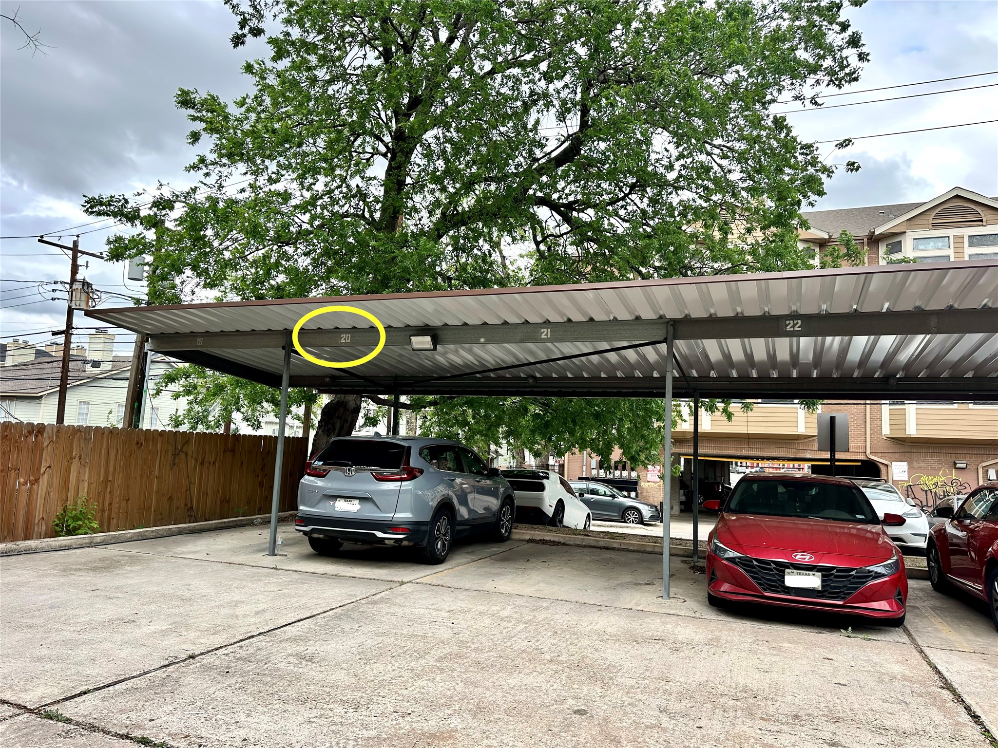 2801 Rio Grande Street, Unit 203 Austin, TX 78705 - Photo 21 of 25 Deeeded covered parking. 2023 structure