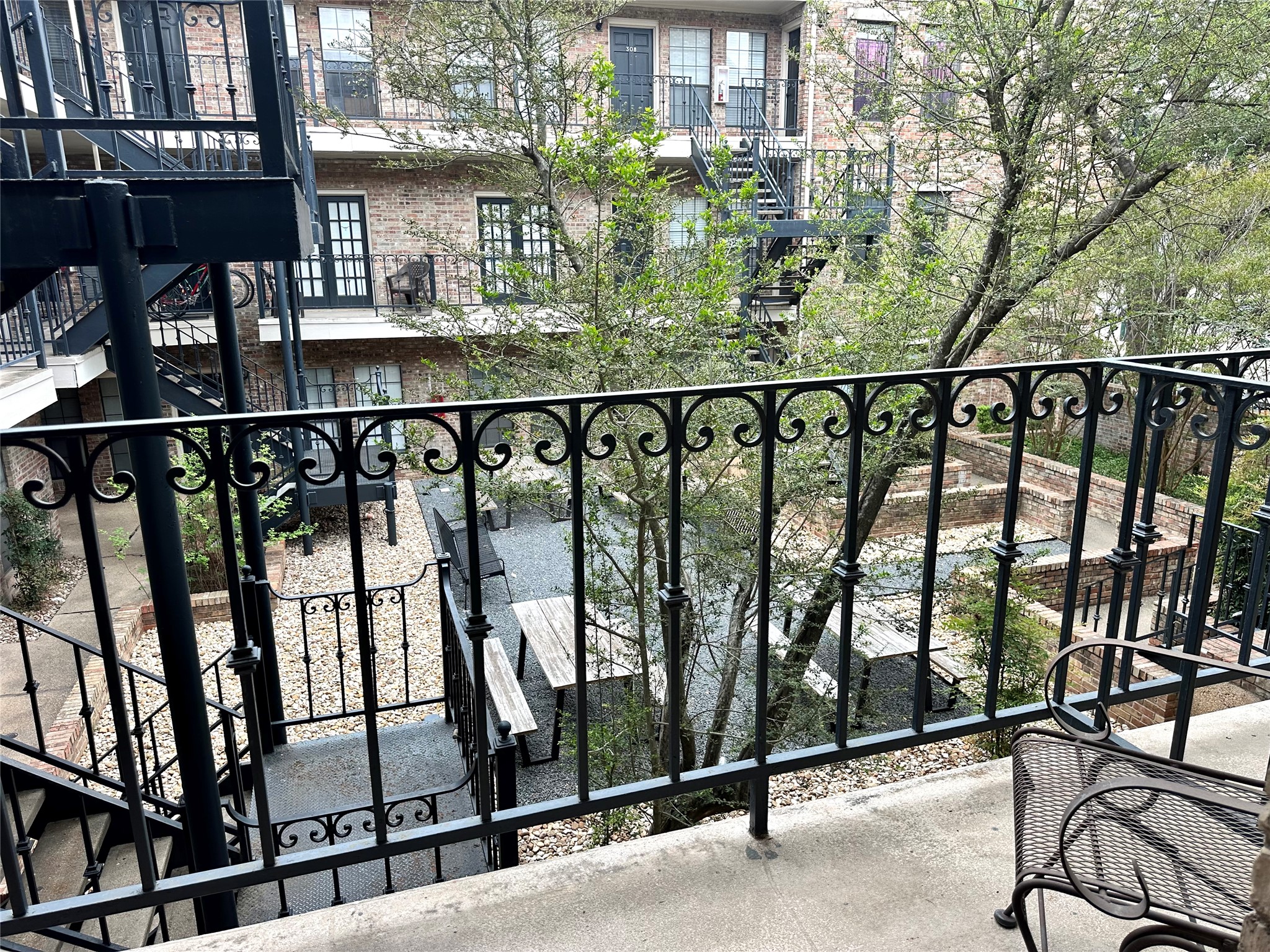2801 Rio Grande Street, Unit 203 Austin, TX 78705 - Photo 6 of 25 View from the primary bedroom balcony