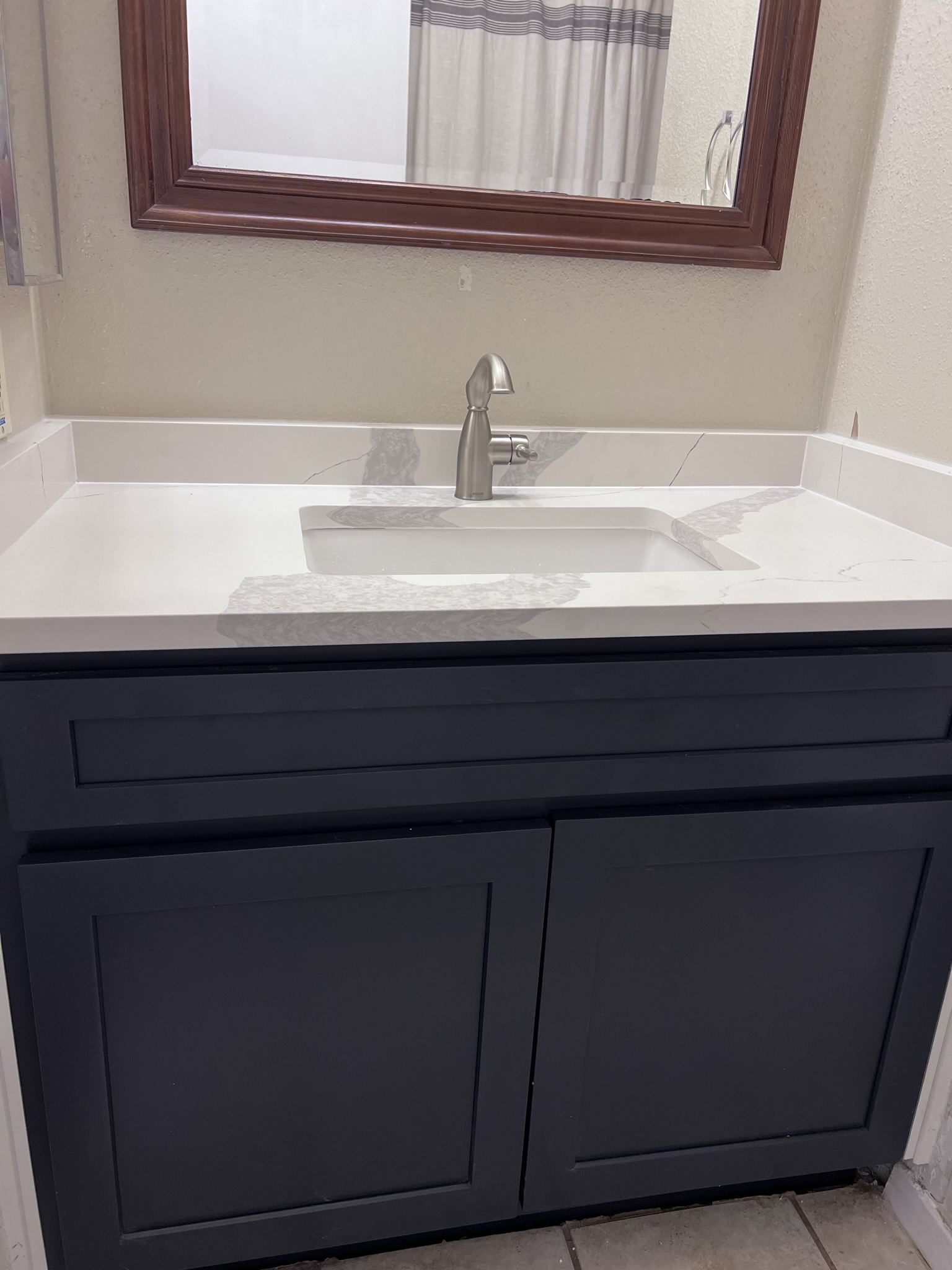 2801 Rio Grande Street, Unit 203 Austin, TX 78705 - Photo 9 of 25 2nd bathroom has 2023 vanity, quartz countertop and faucet.