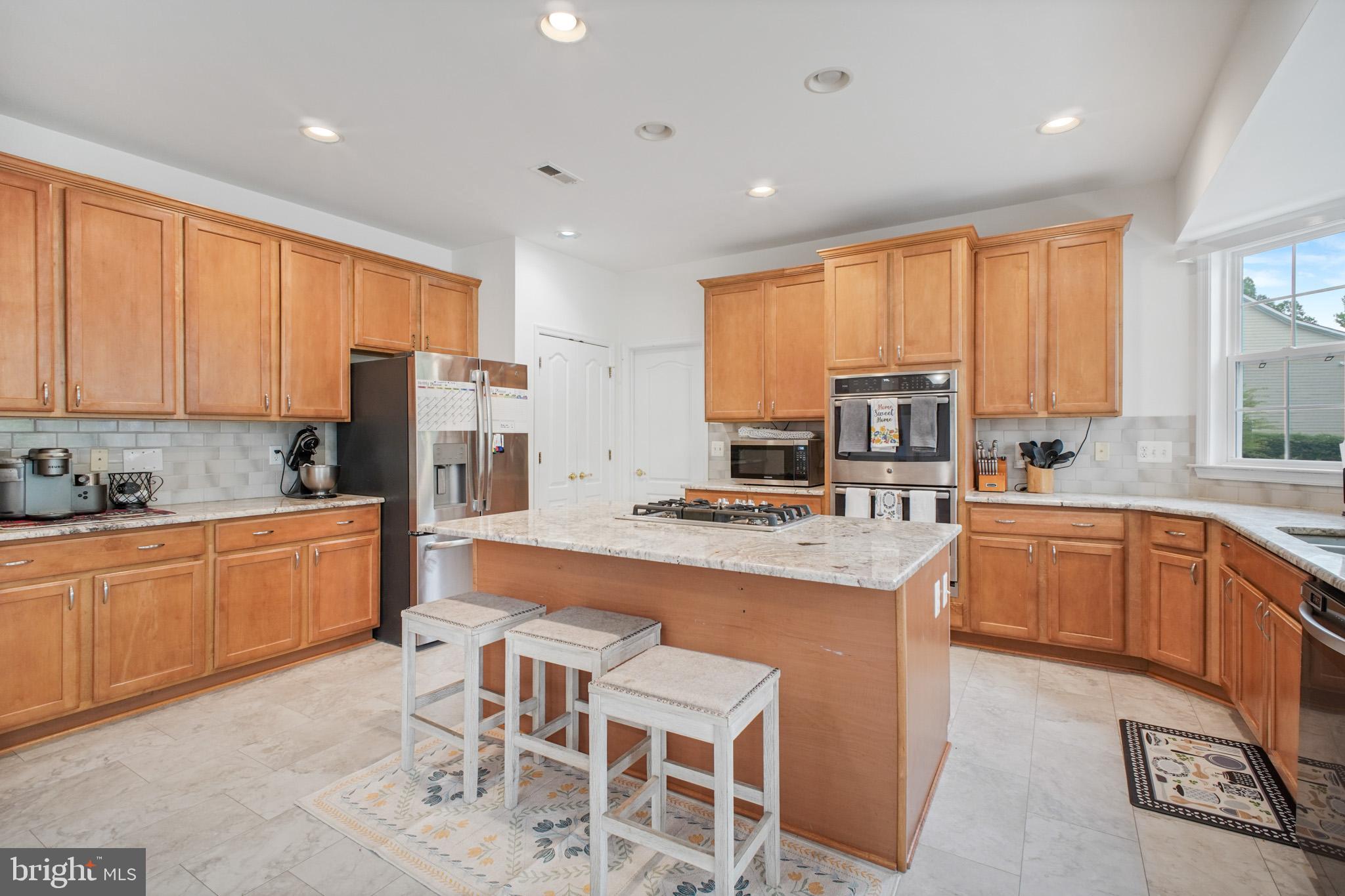 12504 Single Oak Road Fredericksburg, VA 22407 - Photo 18 of 74 The LVT makes the granite countertops POP!