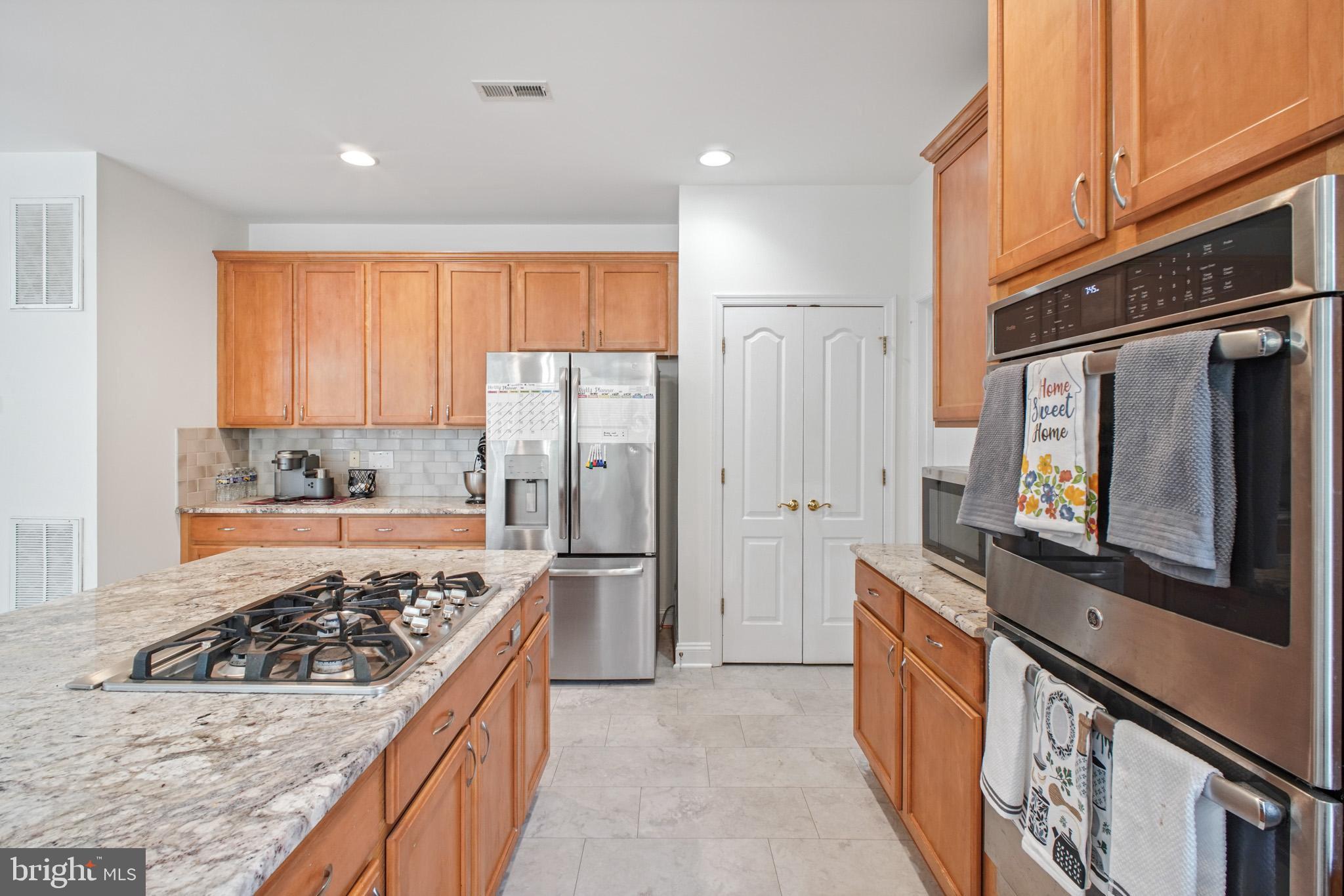 12504 Single Oak Road Fredericksburg, VA 22407 - Photo 19 of 74 Oak Cabinets glow with the recent improvements