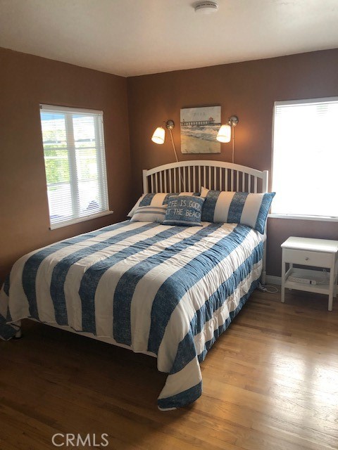 640 Cuprien Way Laguna Beach, CA 92651 - Photo 11 of 18 a spacious bedroom with a bed and a window