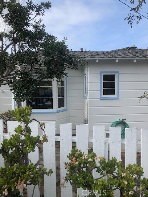 640 Cuprien Way Laguna Beach, CA 92651 - Photo 2 of 18 a view of a house with a flower garden
