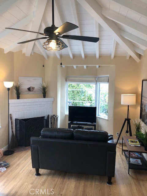 640 Cuprien Way Laguna Beach, CA 92651 - Photo 3 of 18 a living room with furniture and a flat screen tv