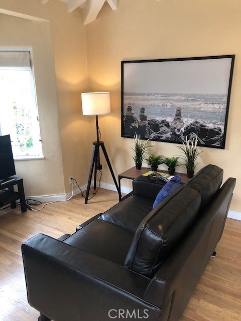 640 Cuprien Way Laguna Beach, CA 92651 - Photo 4 of 18 a living room with furniture and a flat screen tv