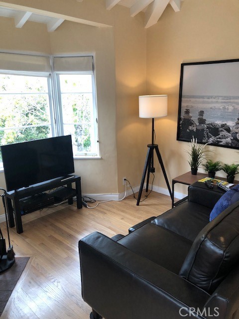 640 Cuprien Way Laguna Beach, CA 92651 - Photo 5 of 18 a living room with furniture and a flat screen tv
