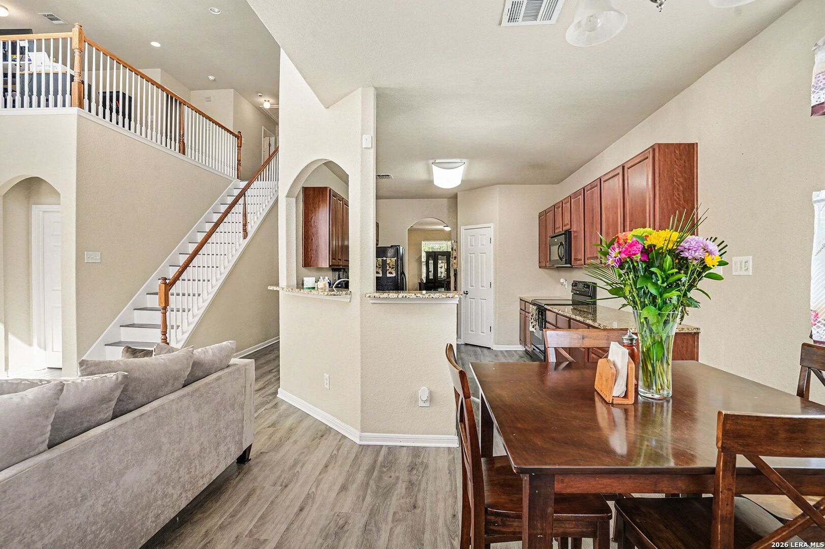 213 Wildcat Cibolo, TX 78108 - Photo 15 of 35 a dining room with furniture and wooden floor
