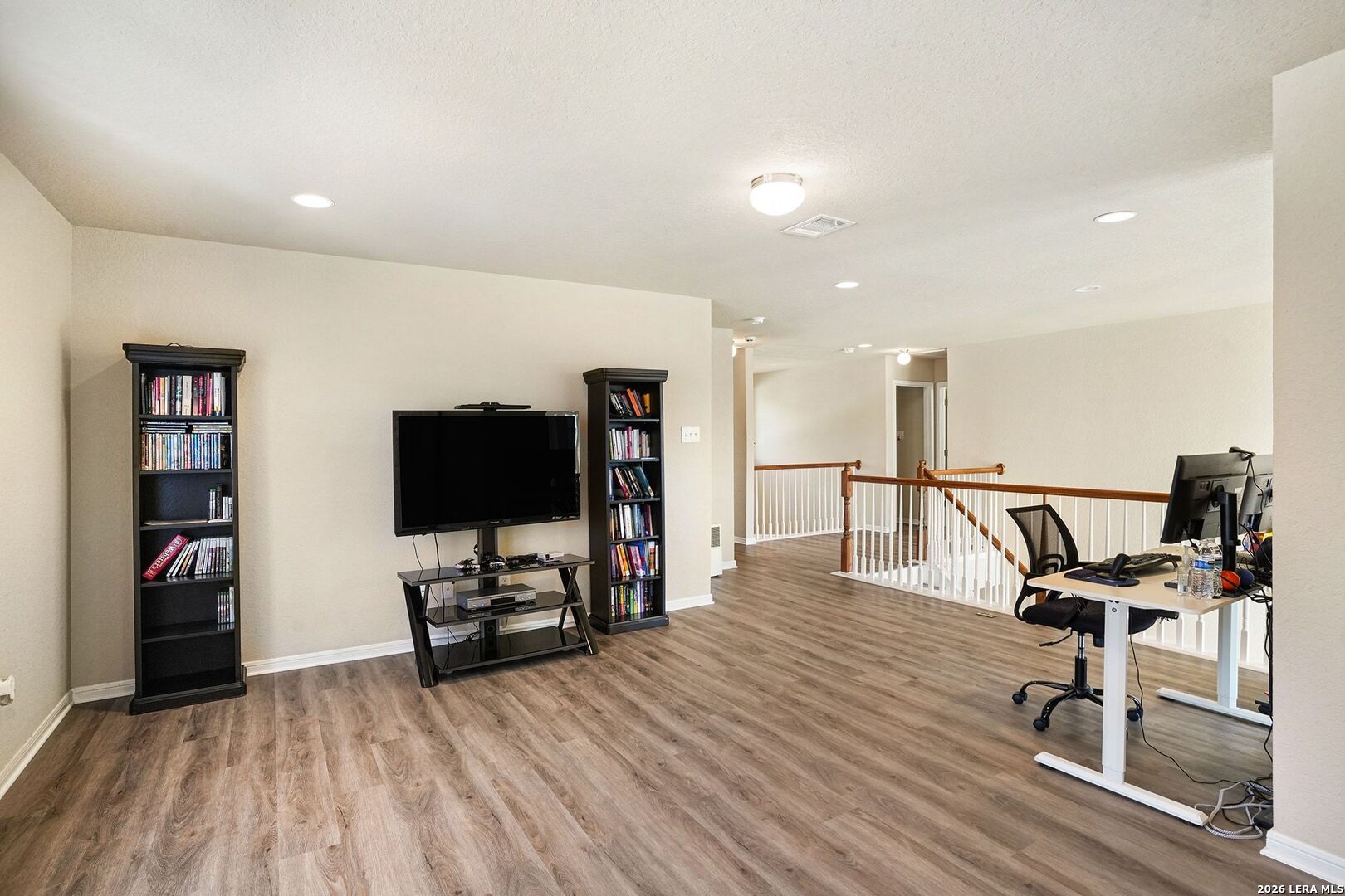 213 Wildcat Cibolo, TX 78108 - Photo 22 of 35 a living room with furniture and a flat screen tv