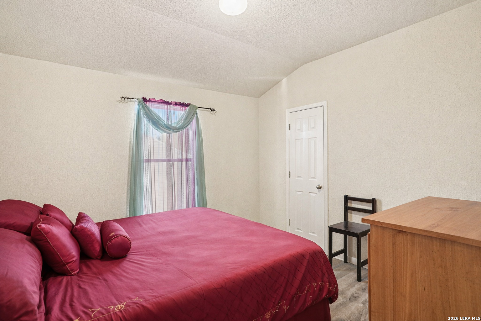 213 Wildcat Cibolo, TX 78108 - Photo 28 of 35 a bedroom with a bed and a closet