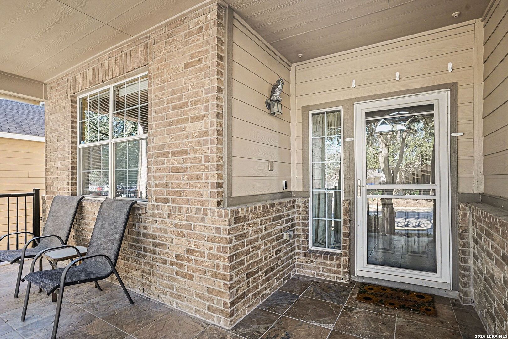 213 Wildcat Cibolo, TX 78108 - Photo 3 of 35 a view of a door with a chair and a door