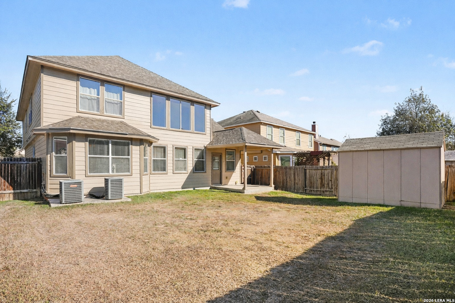 213 Wildcat Cibolo, TX 78108 - Photo 33 of 35 a front view of a house with a yard