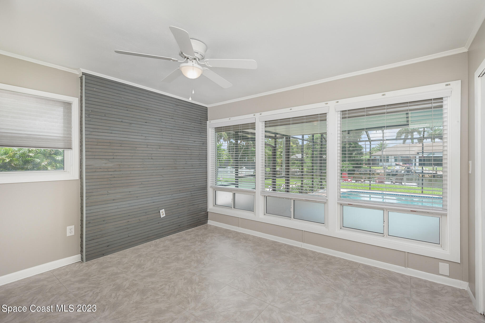 925 Trinidad Road Cocoa Beach, FL 32931 - Photo 20 of 32 a view of an empty room with a window