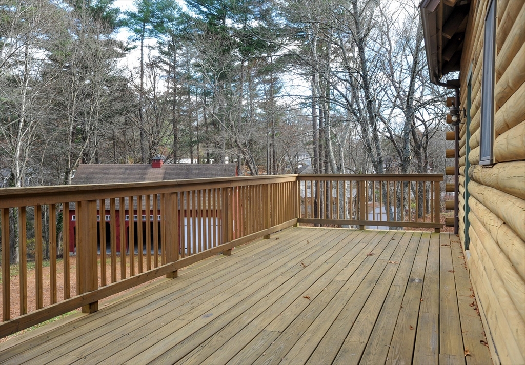 134 Crescent Street Hanson, MA 02341 - Photo 14 of 31 a view of wooden deck and a garden