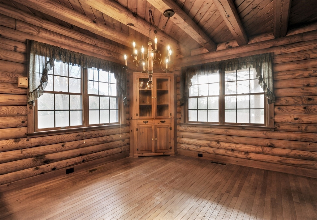 134 Crescent Street Hanson, MA 02341 - Photo 19 of 31 a view of room with window and wooden floor