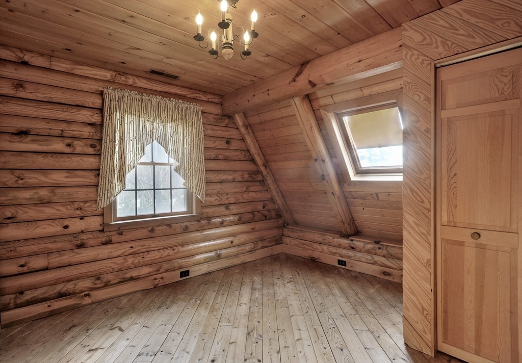 134 Crescent Street Hanson, MA 02341 - Photo 25 of 31 a view of empty room with wooden floor and fan