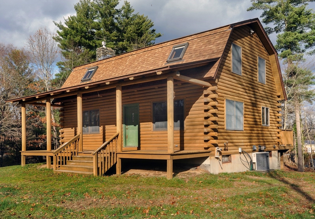 134 Crescent Street Hanson, MA 02341 - Photo 4 of 31 a view of a house with a yard