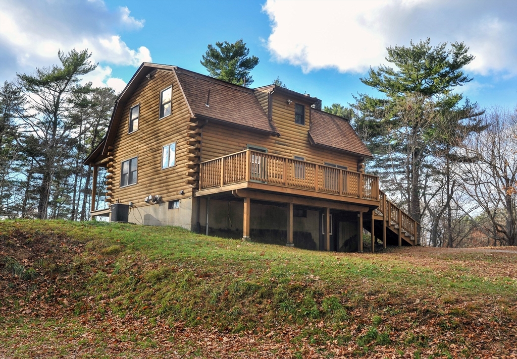 134 Crescent Street Hanson, MA 02341 - Photo 7 of 31 a view of a house with a yard