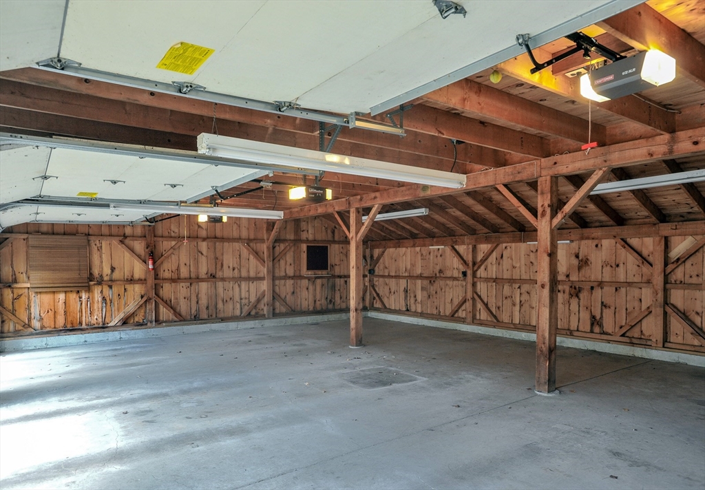 134 Crescent Street Hanson, MA 02341 - Photo 10 of 31 a view of an empty room with wooden floor