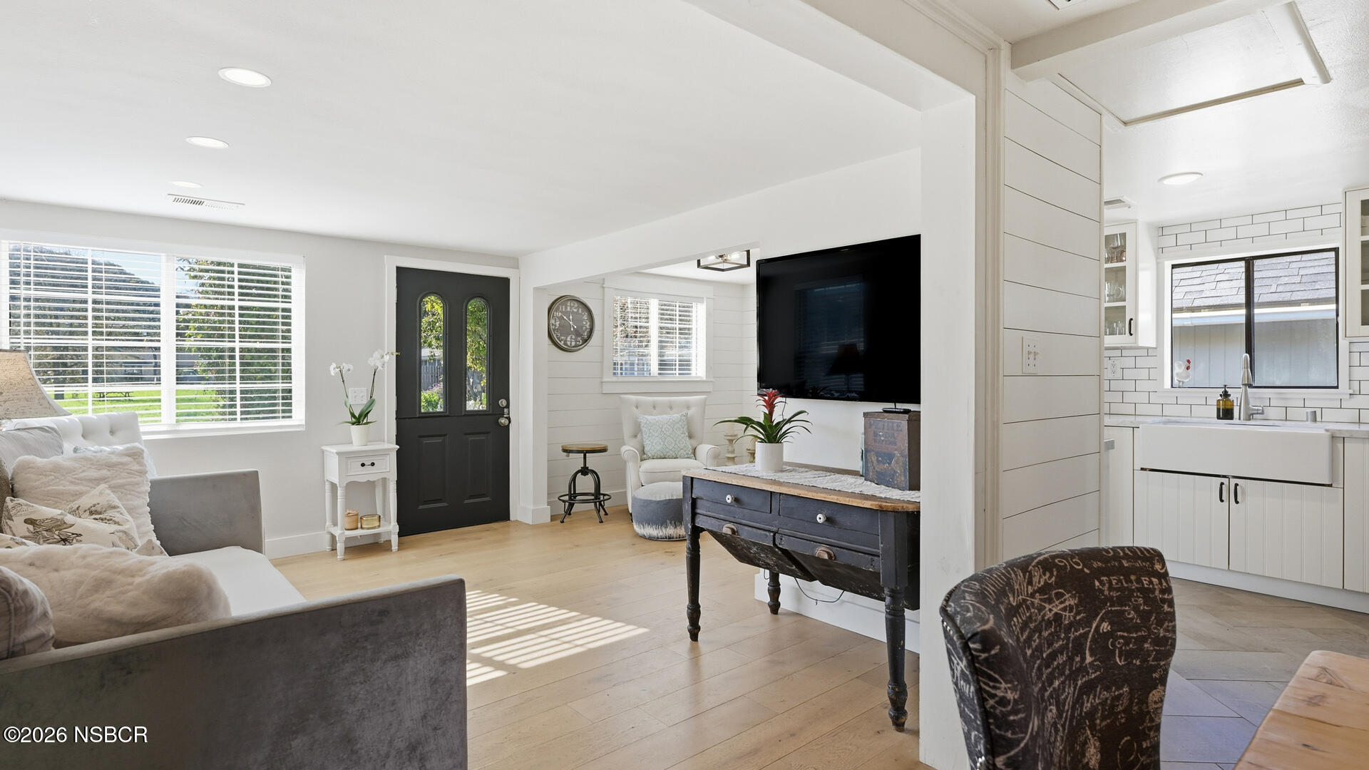 545 Perkins Street Los Alamos, CA 93440 - Photo 2 of 49 a living room with furniture and a flat screen tv