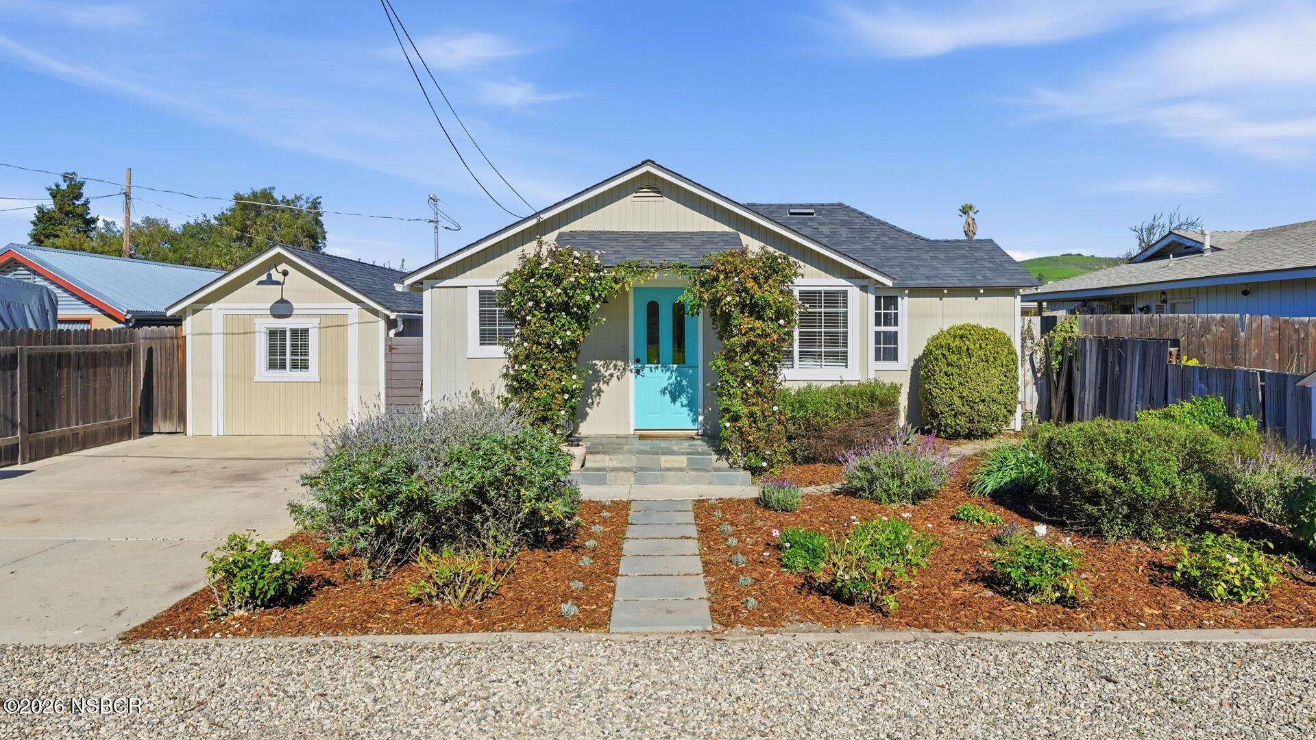 545 Perkins Street Los Alamos, CA 93440 - Photo 37 of 49 a front view of a house with garden