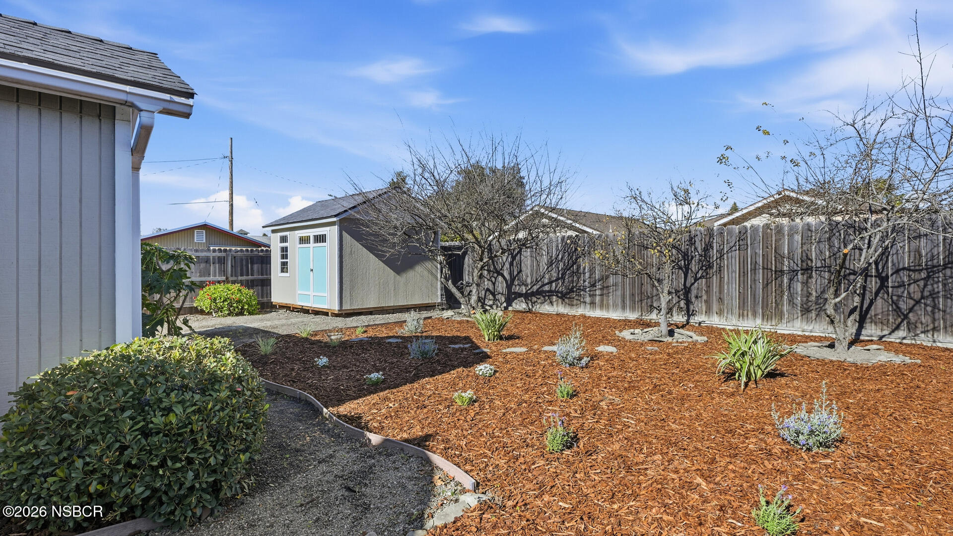 545 Perkins Street Los Alamos, CA 93440 - Photo 39 of 49 front view of a house with a yard