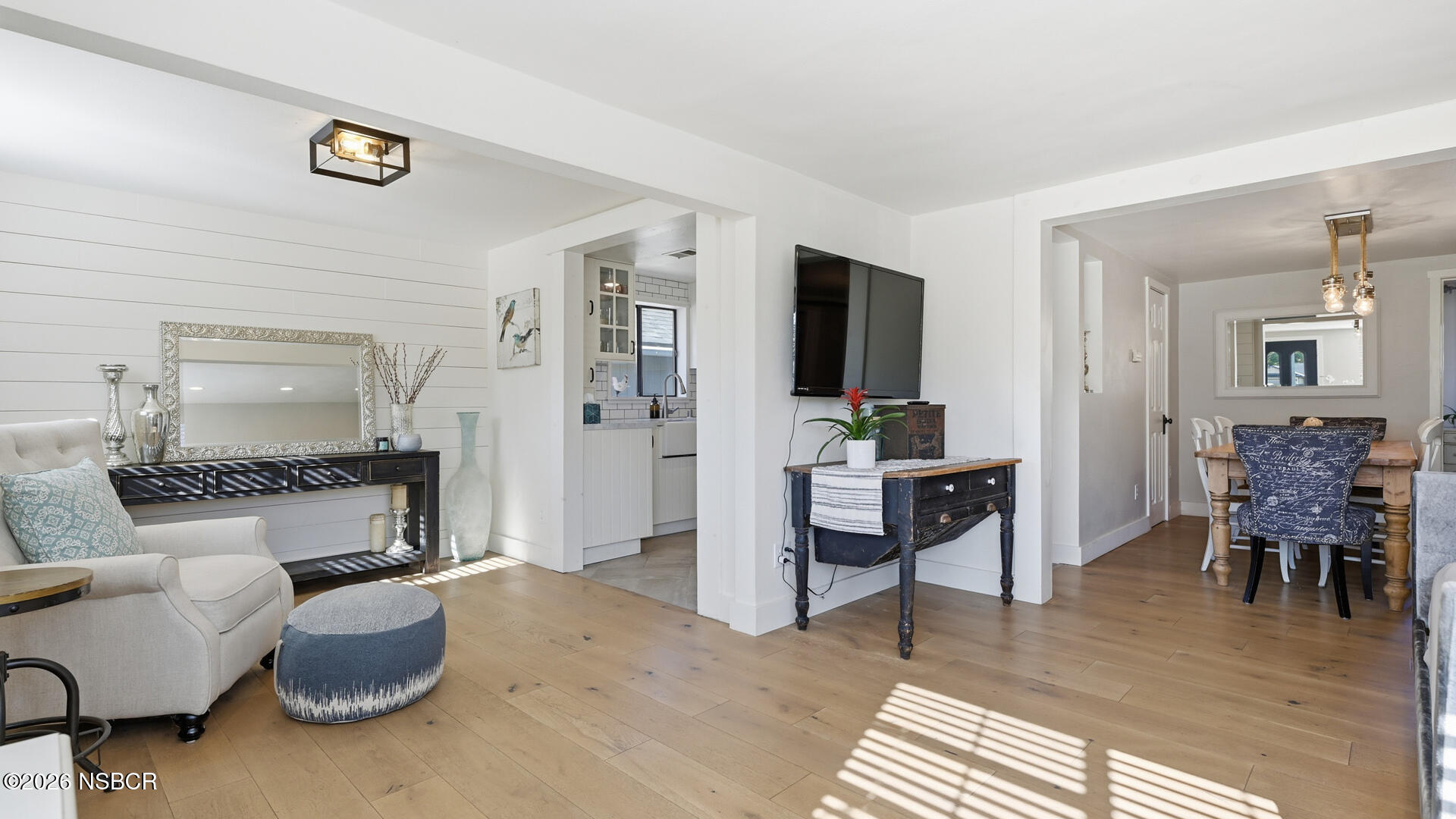545 Perkins Street Los Alamos, CA 93440 - Photo 4 of 49 a living room with furniture and a table