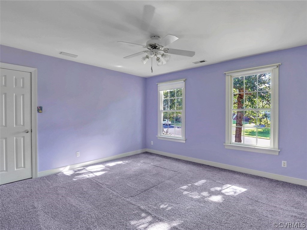 1930 Corner Rock Road Midlothian, VA 23113 - Photo 23 of 37 an empty room with windows and closet
