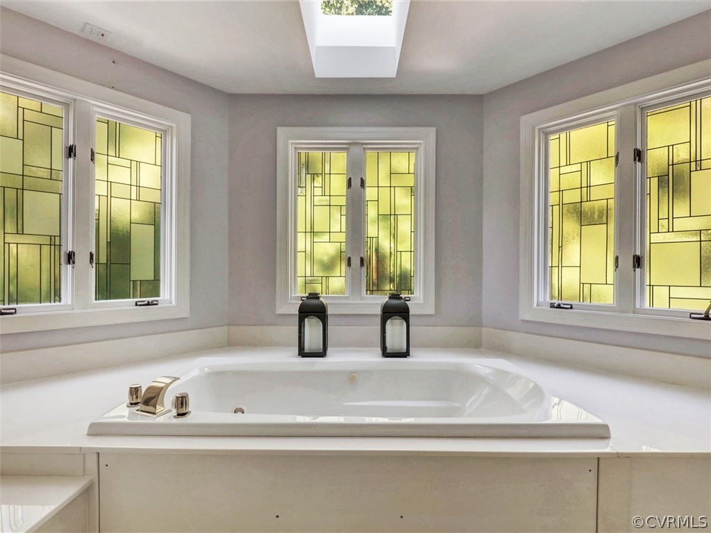 1930 Corner Rock Road Midlothian, VA 23113 - Photo 30 of 37 a bathroom with a bathtub and window