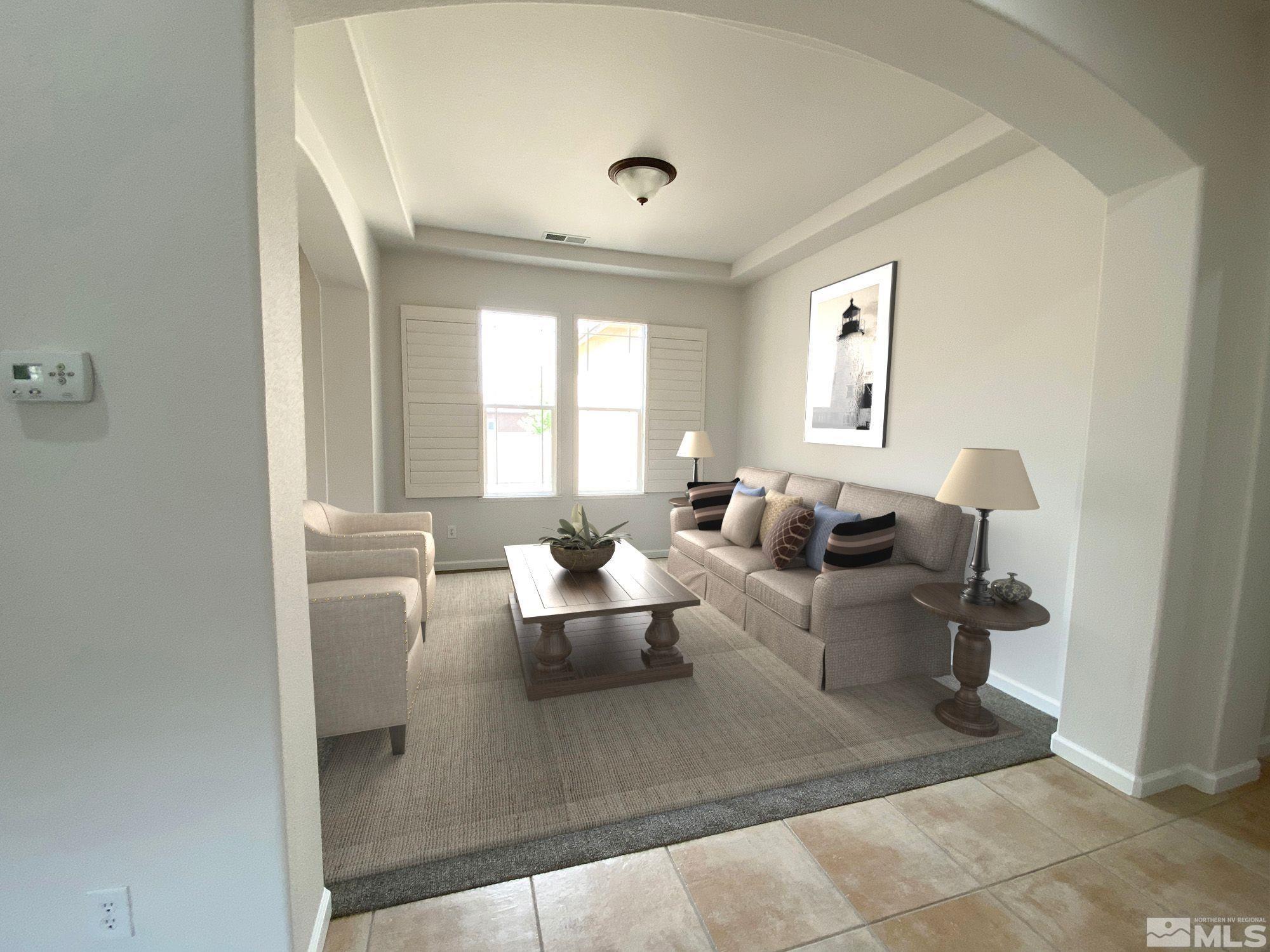 2700 Trail Rider Drive Reno, NV 89521 - Photo 5 of 29 a living room with furniture and a large window