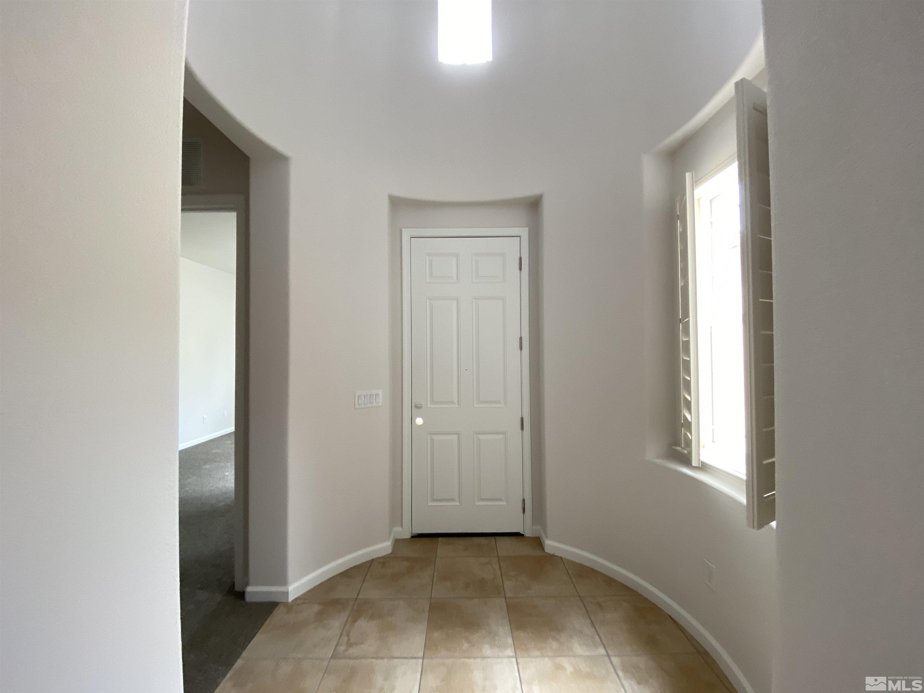 2700 Trail Rider Drive Reno, NV 89521 - Photo 9 of 29 an empty room with windows and closet