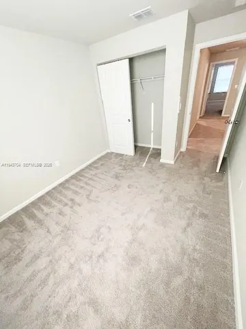 an empty room with an entryway