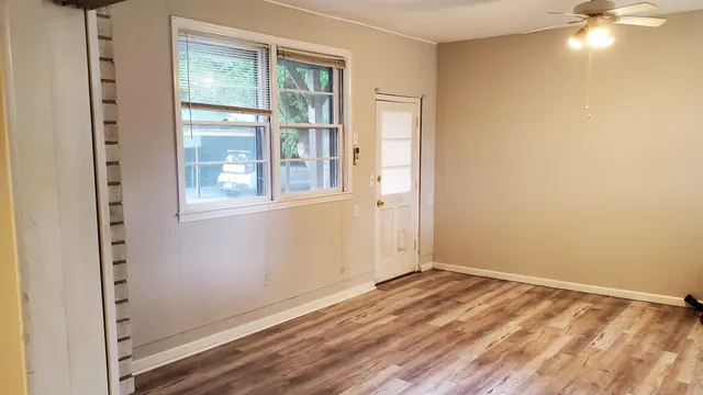 an empty room with windows