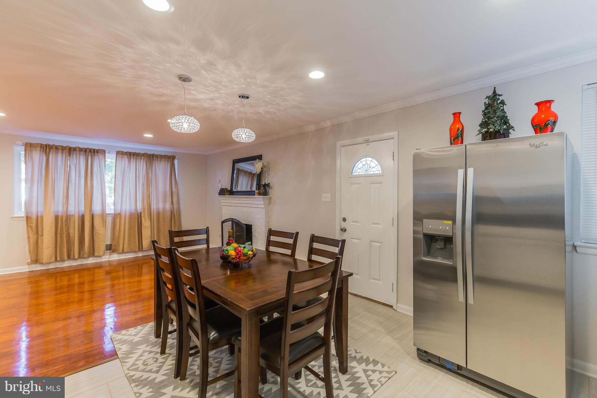 8303 Allentown Road Fort Washington, MD 20744 - Photo 11 of 30 a view of a dining room with furniture