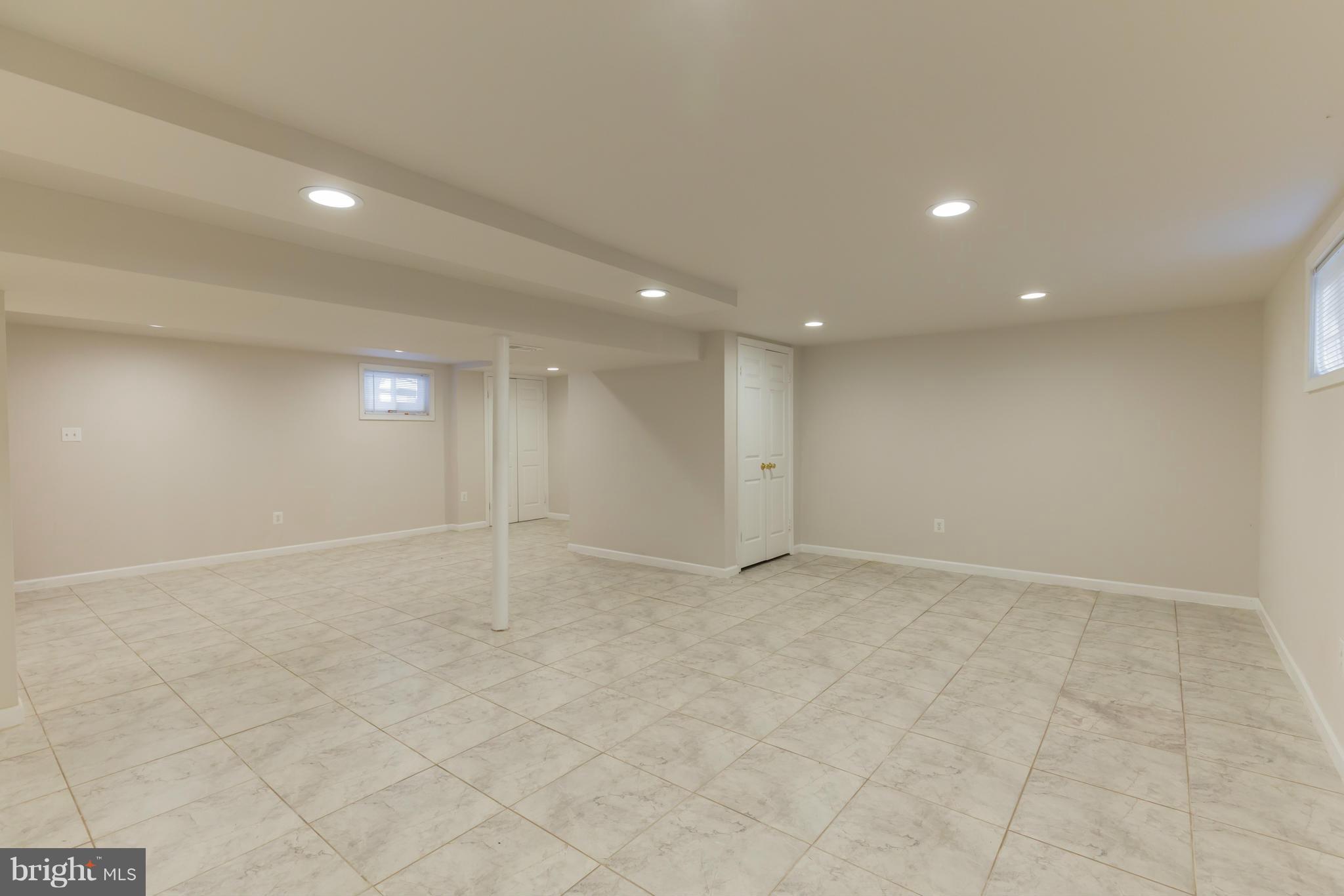 8303 Allentown Road Fort Washington, MD 20744 - Photo 22 of 30 an empty room with window and pillar in it
