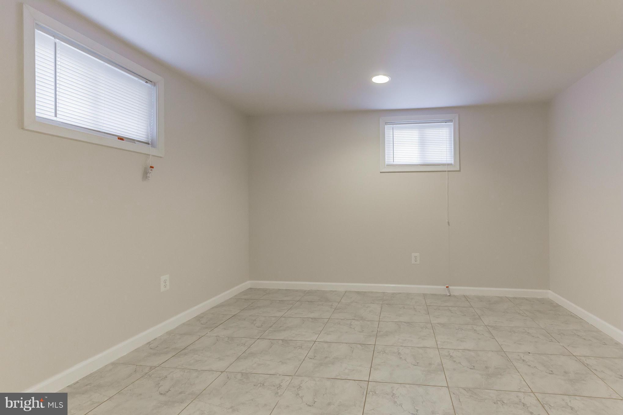 8303 Allentown Road Fort Washington, MD 20744 - Photo 26 of 30 an empty room with a window