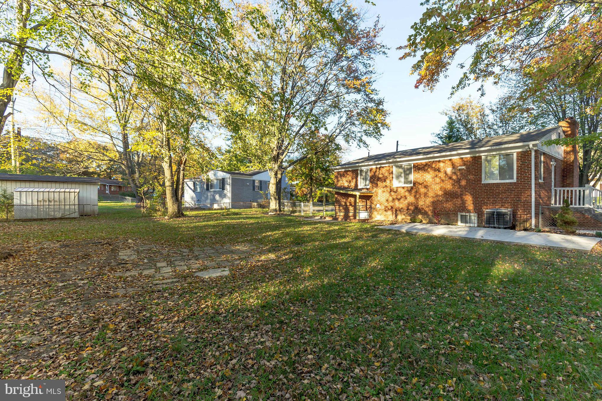 8303 Allentown Road Fort Washington, MD 20744 - Photo 27 of 30 a view of a backyard with large trees