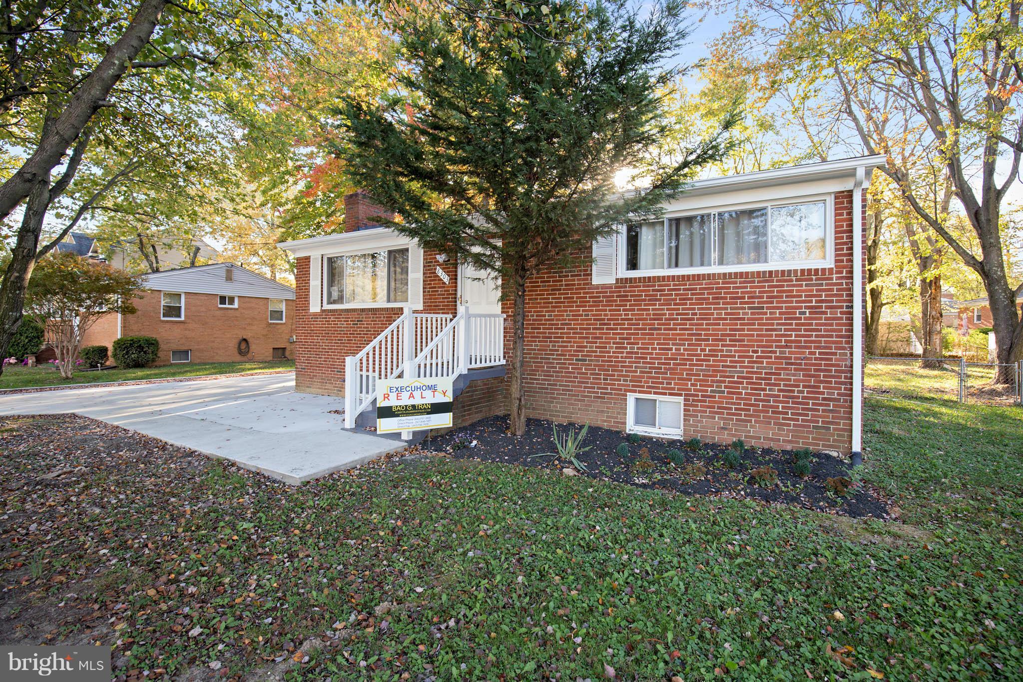 8303 Allentown Road Fort Washington, MD 20744 - Photo 30 of 30 a view of a house with backyard and a tree